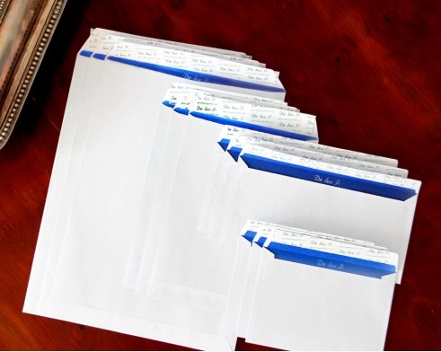 Koperty białe C5 HK Delux 162x229mm poddruk granatowy 120g 500 szt.